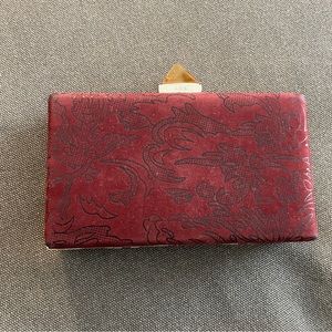 ABS Allen Schwartz red patterned velvet clutch with metal strap